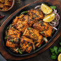 Grilled salmon fish tikka in achari marinade