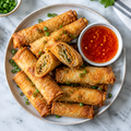 Crispy noodle spring rolls with dipping sauce